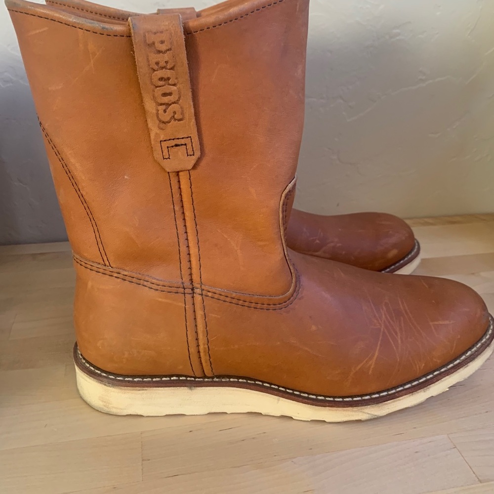 Mens 9 inch Premium Red Wing leather work boots.